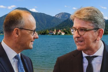 Friedrich Merz und Wolfram Weimer im Bundestag